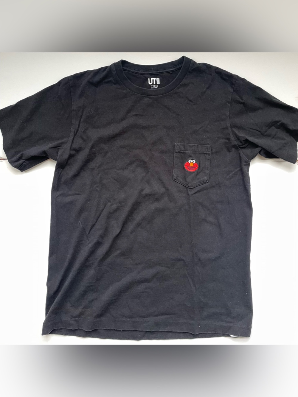 2/$40 - Men’s Uniqlo x Kaws Elmo pocket tee - M
